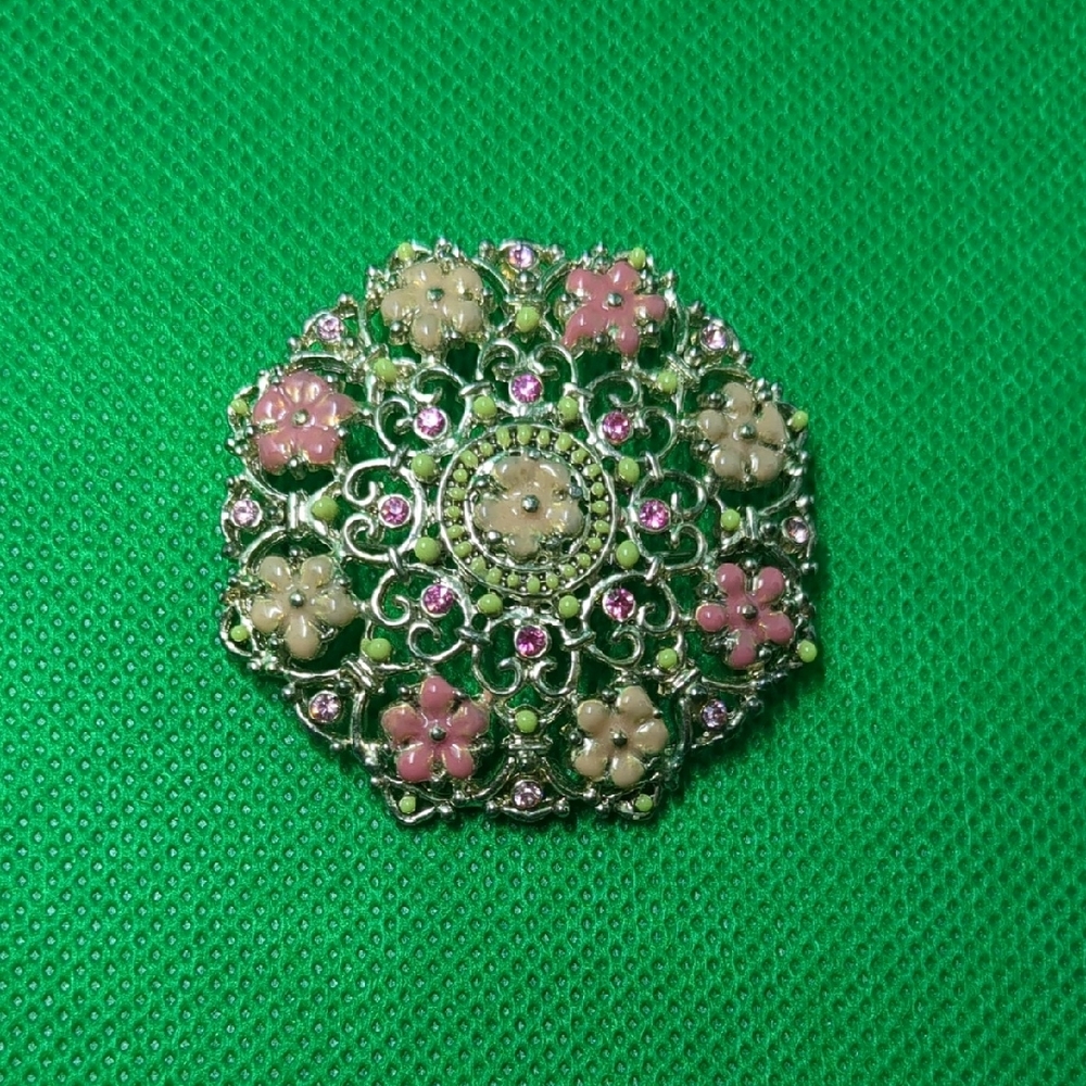 Vintage Pink and Green Brooch with Intricate Metalwork